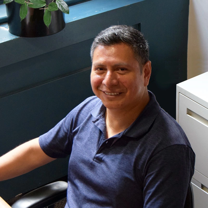 portrait of Carlos, Optima's 20-year-plus veteran